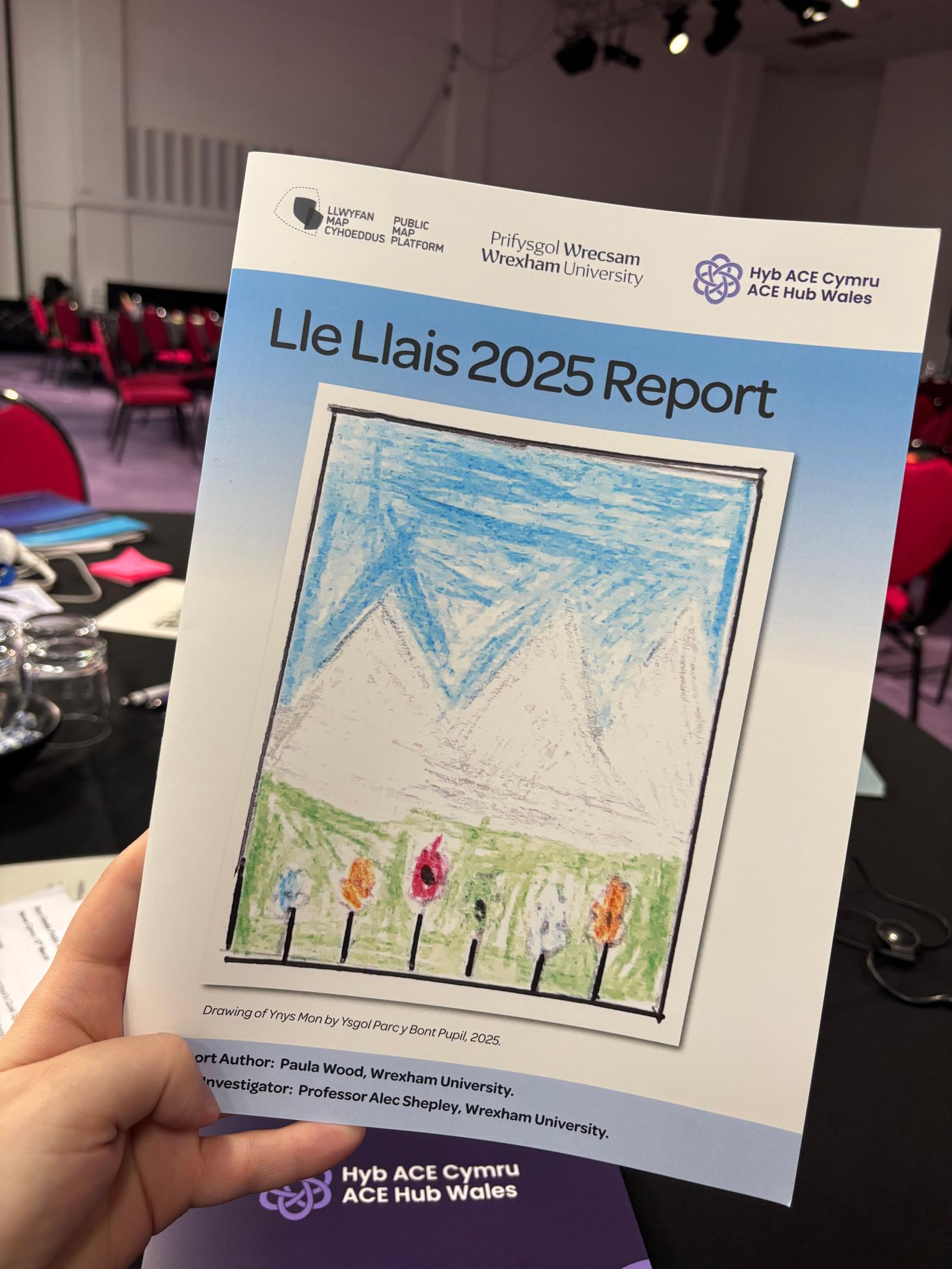 The team holding copies of the report